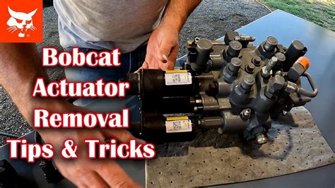 how to replace a actuator on a skid steer|bobcat actuator youtube.